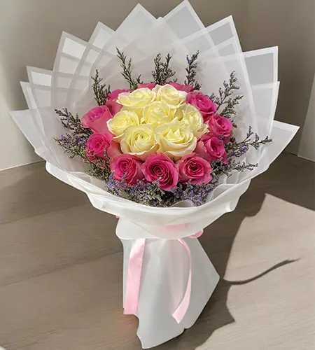 Lavishing 15 Pink And White Roses Bouquet