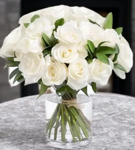 25 White Roses in an Elegant Glass Vase