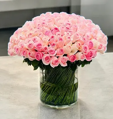 100 Pink Roses in Glas...